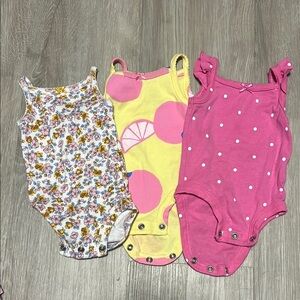 4/$20 Carters Newborn Floral, Yellow, and Pink Kids One Pieces Set